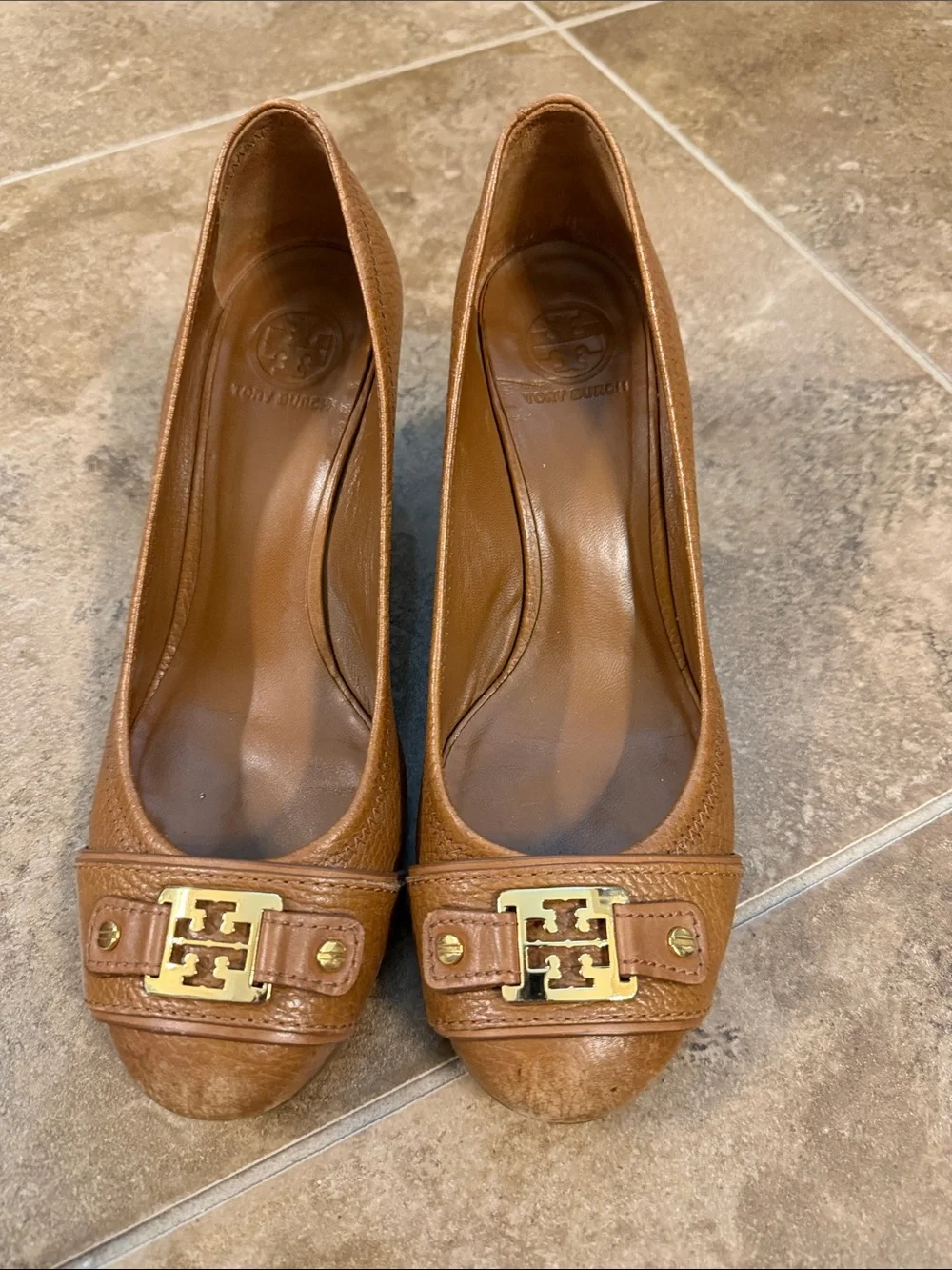 Tory Burch Cognac Leather Logo Cap-Toe Heels- worn on the front